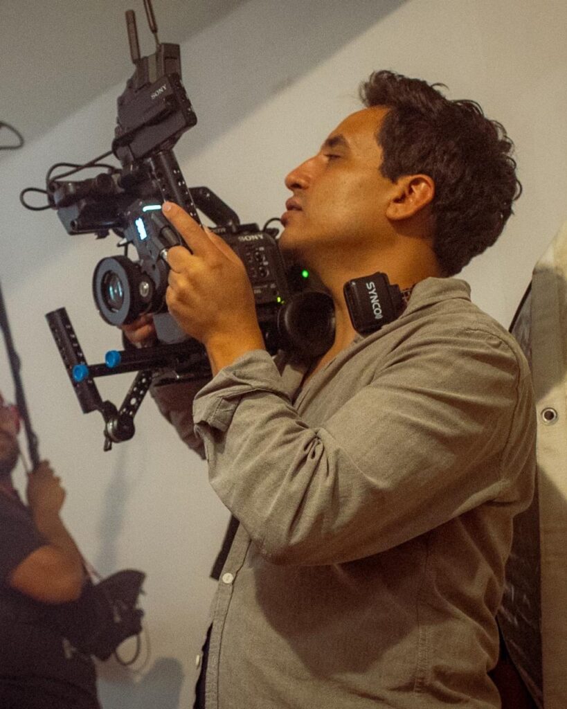 Guillermo Carrillo filming with a cinema camera
