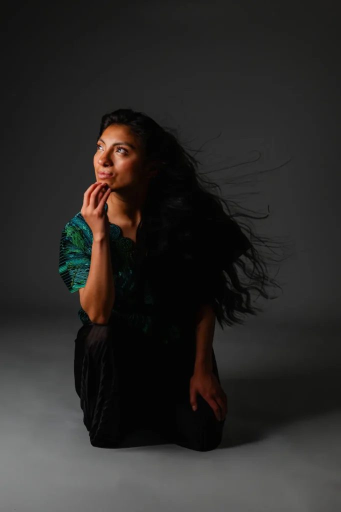 Kneeling, hair in motion