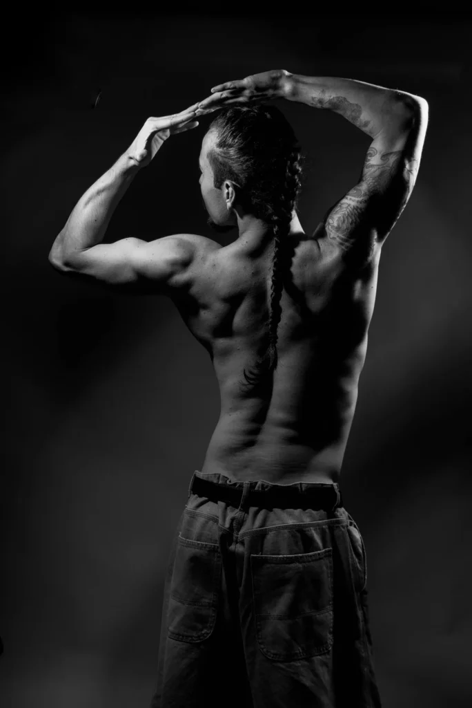 From behind: the braid, arms overhead