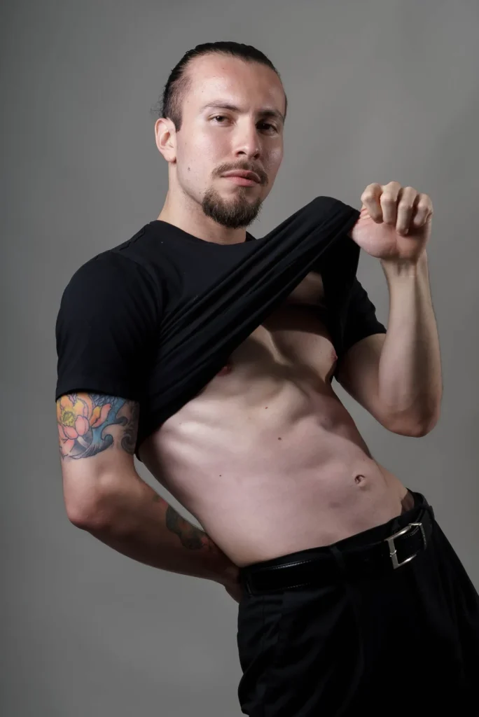Lifting his shirt