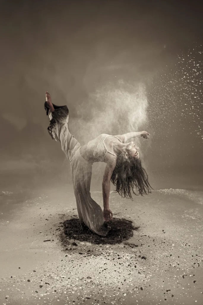 Arching back in a cloud of dust