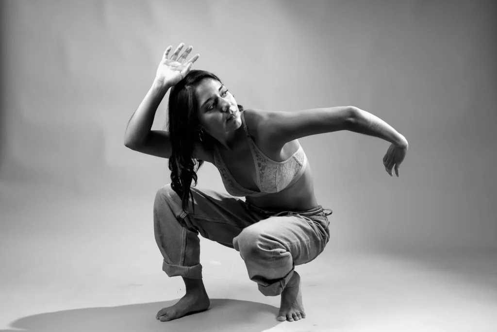 Crouched, in black and white