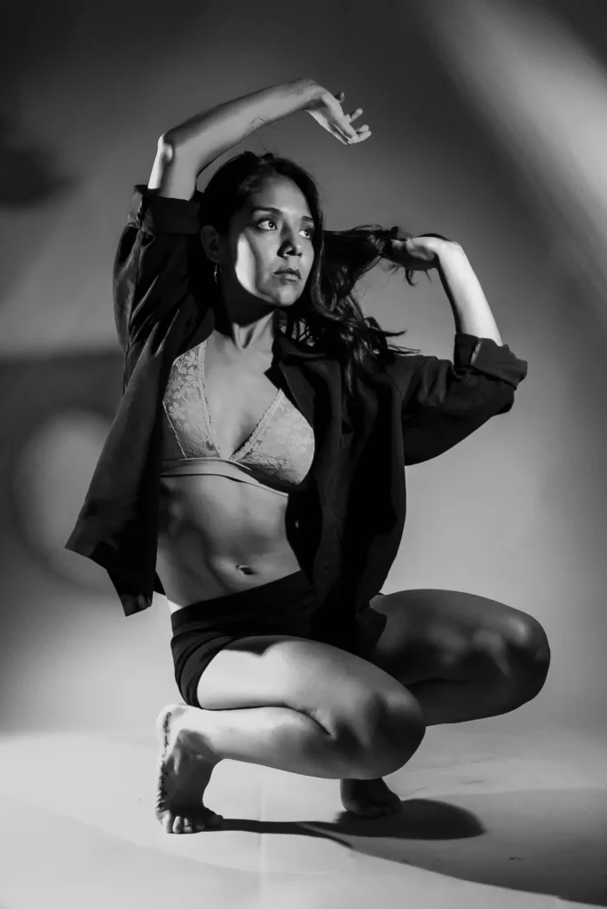 Crouched, one arm raised