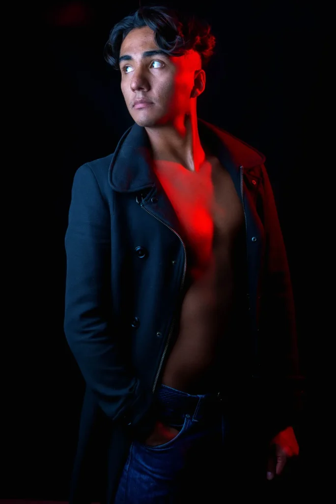An open coat and a streak of red light