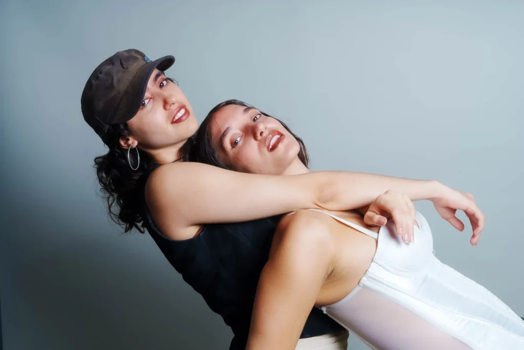 An embrace, leaning back