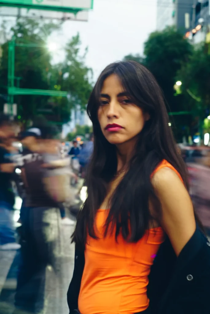 An orange top on the avenue